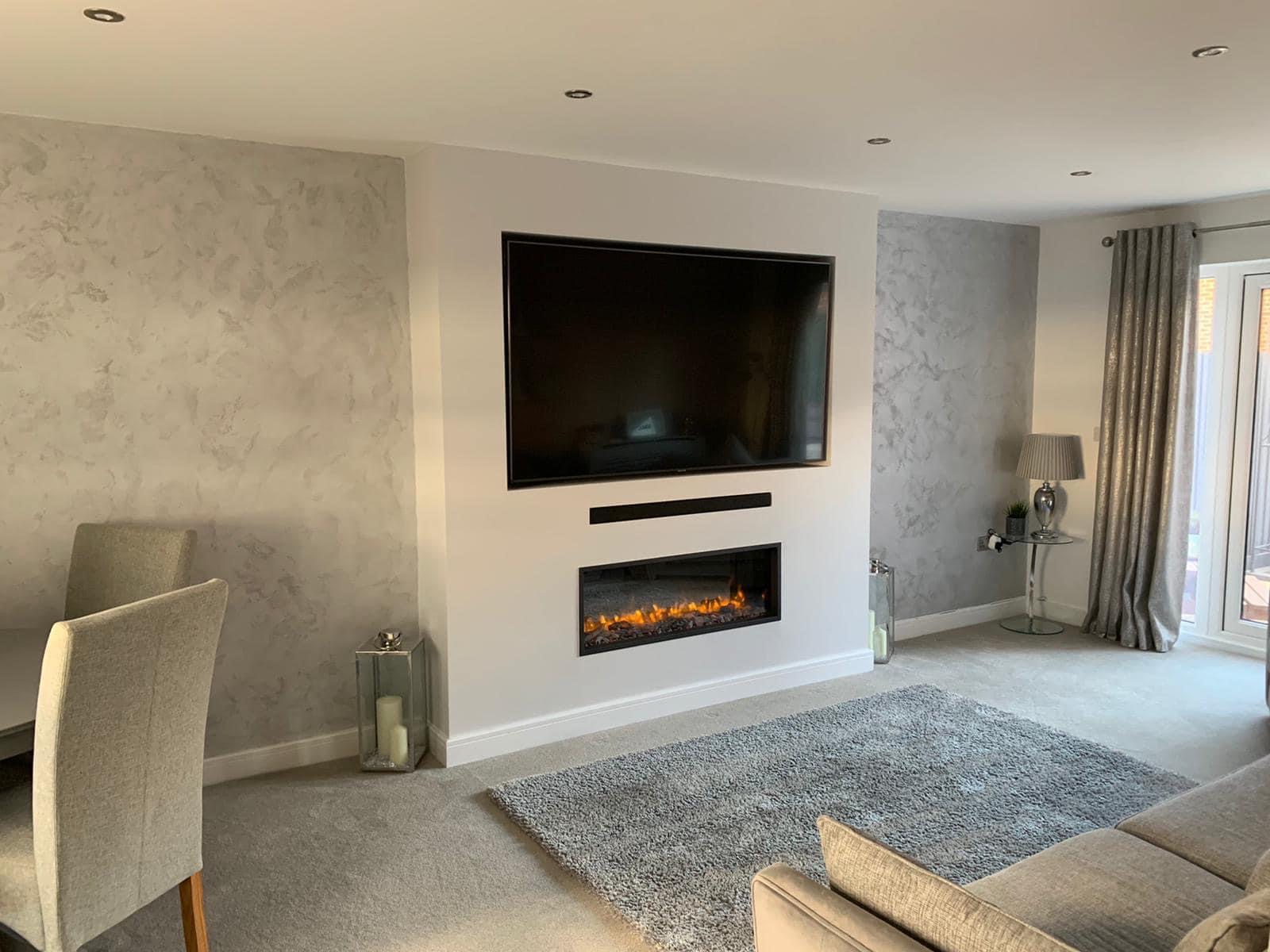Rendered media wall with a TV and an inset fire in a bright living room